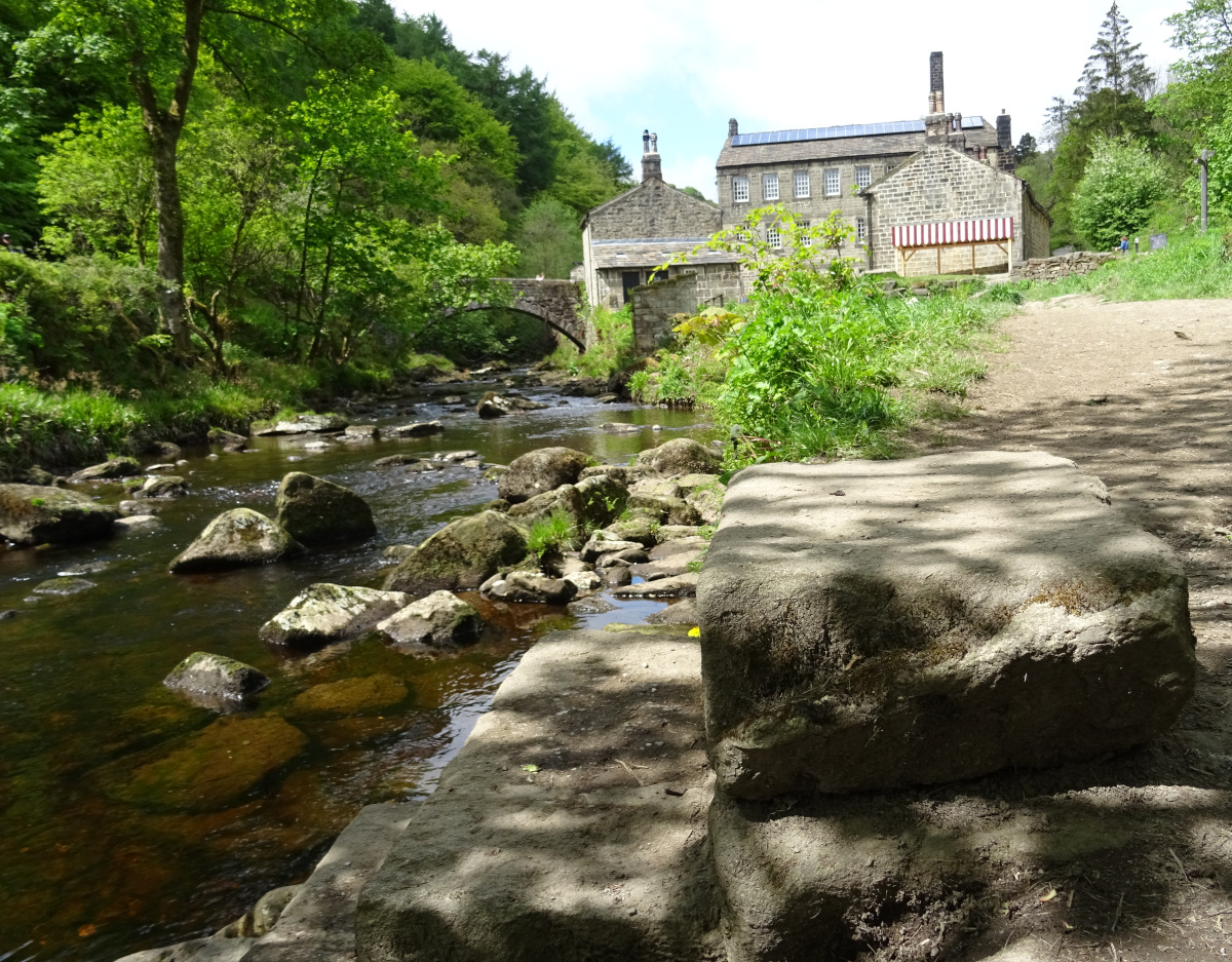 The view of gibson mill at hardcastle crags taken from the stepping stones.