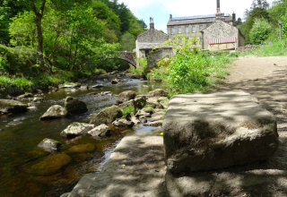 The view of gibson mill at hardcastle crags taken from the stepping stones.